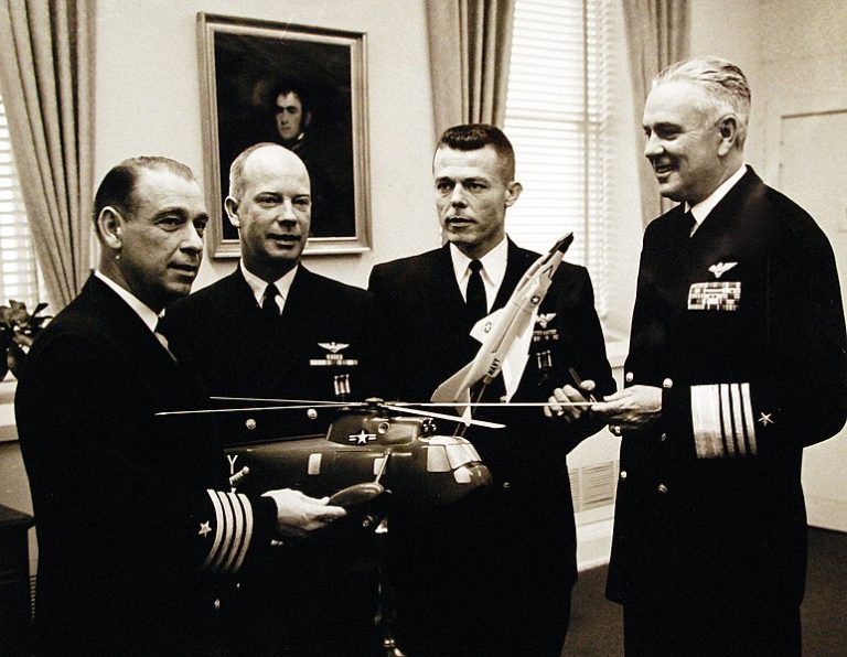 Three Naval Aviators were presented Distinguished Flying Crosses by Chief of Naval Operations Admiral George W. Anderson, USN, (right), in Pentagon ceremonies.