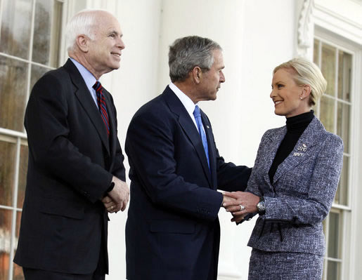 Republican presidential nominee Senator John McCain and his wife Cindy with President George W. Bush at the White House, Wednesday, March 5, 2008.