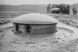 Block 14 at the Ouvrage du Hochwald on the Maginot Line in 1940; 135 mm turret and Cloche GFM. Source: Wikipedia.