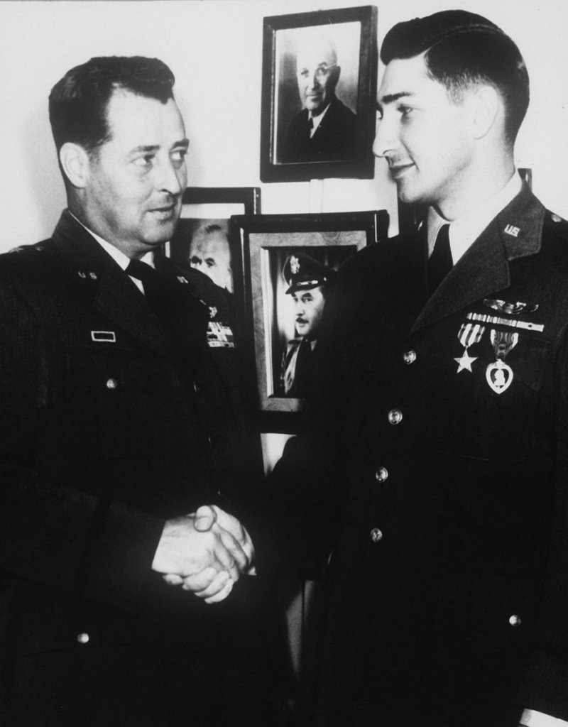 U.S. Air Force pilot receiving the Purple Heart and Silver Star during the Korean War.
