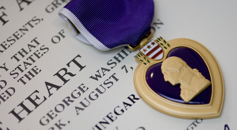 The Purple Heart medal is prepared for a presentation ceremony at the Center for the Intrepid, Fort Sam Houston, Texas, Nov. 17, 2008.