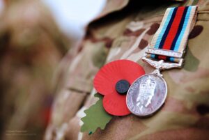 A soldier wearing a poppy and an Afghanistan Medal. Image courtesy of Defence Imagery via Flickr Commons.