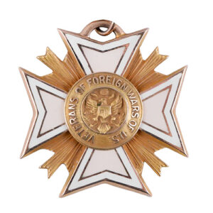 A Veterans Of Foreign Wars Of The United States Membership Badge struck in gold.